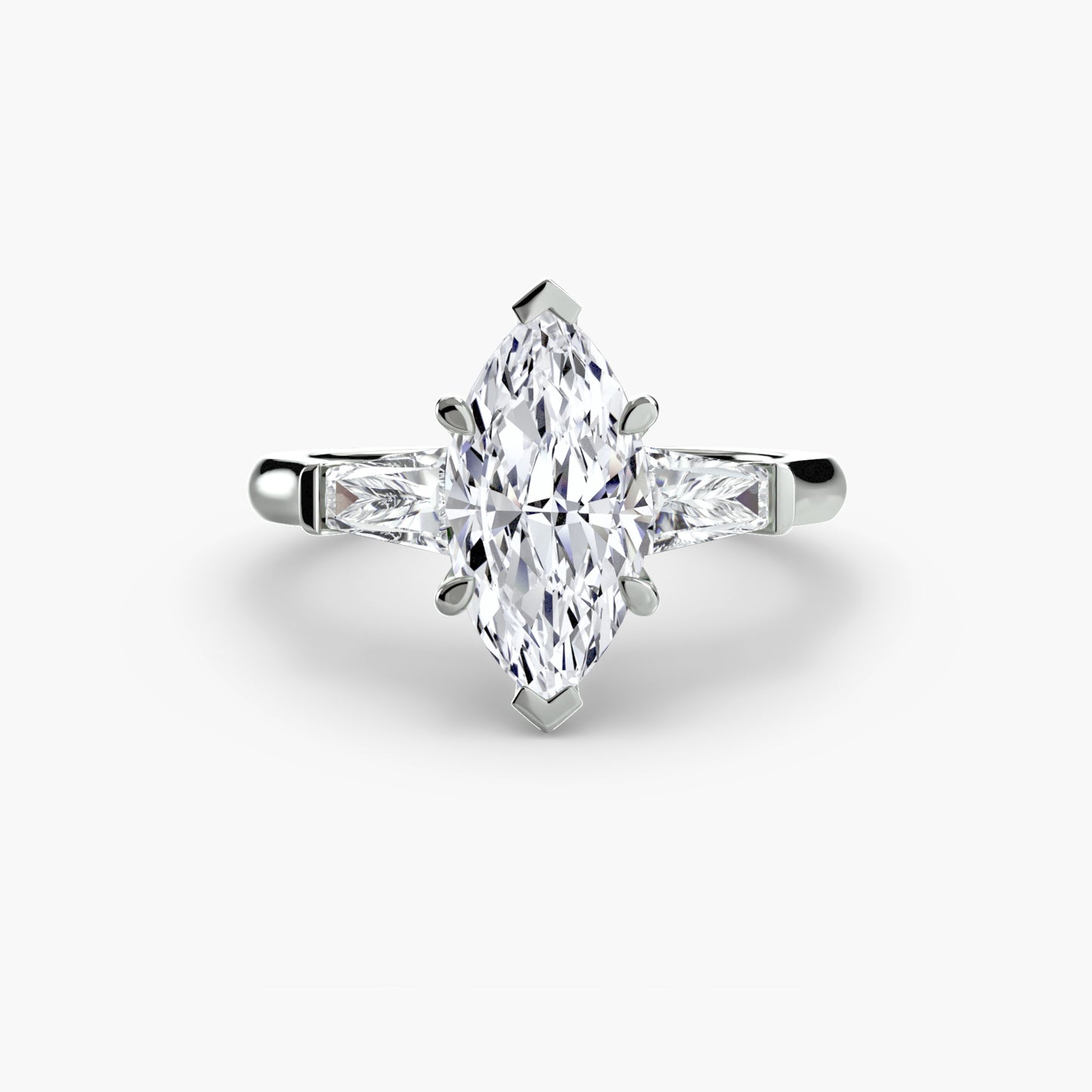 three-stone ring (baguette side stones)