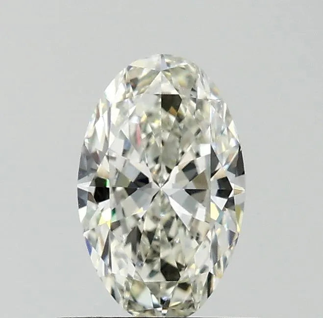 0.60ct oval natural diamond (colour i, clarity vs2, cut vg, igi certified)
