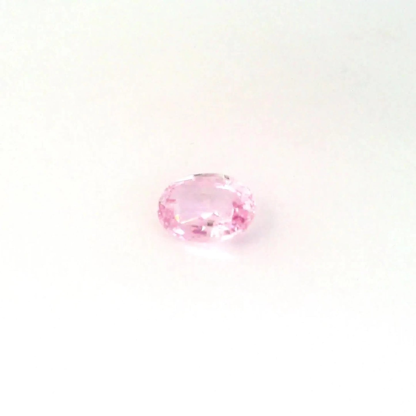 1.65ct oval natural sapphire (colour pink, clarity slightly included, cut faceted)